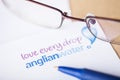 LONDON, UK - AUGUST 18, 2018: Anglian Water supplier logo on paper with glasses and blue pen. Royalty Free Stock Photo