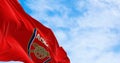 Arsenal Football Club flag waving on a clear day