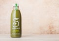 LONDON, UK - AUGUST 10, 2018: Bottle of Innocent organic smoothie juice drink with apple and pear flavour on wood. Royalty Free Stock Photo