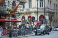 Crowd of people in the Regent street. Tourists, shoppers and business people rush time