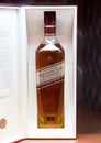 LONDON, UK - AUGUST 31, 2018: Johnnie Walker whiskey bottle on shelf with display logo in liquor store