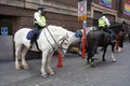 Metropolitan Police Mounted Officers deal with an incident in Central London.