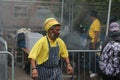 Notting Hill Carnival Jamaican chef cooking jerk chicken in food street market Royalty Free Stock Photo