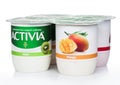 LONDON, UK - AUGUST 18, 2019: Pack of Activia exclusive live yogurt cultures with mango and kiwi on white. Product by Danone