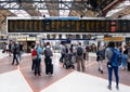 Passengers at the London Victoria train station Royalty Free Stock Photo