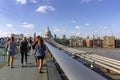 LONDON, UK - AUGUST 2, 2018: People at the famous Millenium Bridge Royalty Free Stock Photo