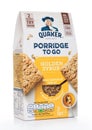 LONDON, UK - AUGUST 18, 2019: Quaker Porridge to go snack bars with golden syrup on white