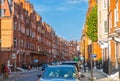 Residential aria of Kensington and Chelsea. Cadogan gate with row of periodic buildings. Luxury property in the centre of London.