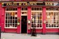 London, UK - August 17, 2010: typical british pub with red facade Royalty Free Stock Photo