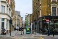 London, UK: Borough High Street with an e-scooter and electric delivery vehicle