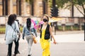 Caucasian girl with rainbow LGBTQ flag at Black Lives Matter Protest