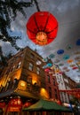 London UK: Chinatown with red Chinese lanterns and colorful parasols