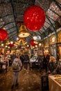 London, UK: Christmas shopping at the Apple Market in Covent Garden Royalty Free Stock Photo