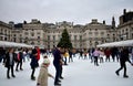People skating on ice at the Somerset House Christmas Ice Rink. London, United Kingdom, December 2018. Royalty Free Stock Photo