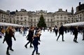 People skating on ice at the Somerset House Christmas Ice Rink. London, United Kingdom, December 2018. Royalty Free Stock Photo