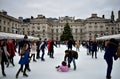 People skating on ice at the Somerset House Christmas Ice Rink. London, United Kingdom, December 2018.