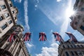 Close up of building on Regent Street London with row of British flags to celebrate the wedding of Prince Harry to Meghan Markle Royalty Free Stock Photo