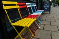 Colorful chairs outside the barber shop