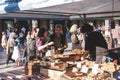 Couple buying pastries in a stall at the Kings Cross Real Food Market in London