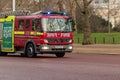 London, UK - 17, December 2018: Emergency response - fire truck rushes down street at London UK Royalty Free Stock Photo