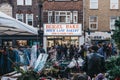 Facade of Beigel Bake Shop in Brick Lane, London, UK, people walk in front, motion blur Royalty Free Stock Photo