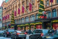 Harrods store facade decorated for Christmas, London UK