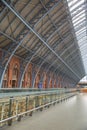 Portrait View of the Gray Metal Arches inside the St Pancras railway station