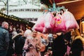 London, UK/Europe; 20/12/2019: Cotton candy hanging on a Christmas stall at the Christmas market of Leicester Square, London