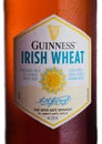 LONDON, UK - FEBRUARY 02, 2018: Bottle lable of Guinness Irish Wheat beer on white.