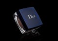 LONDON, UK - FEBRUARY 02, 2018: Glass container of Dior dry face cosmetics powder on black.