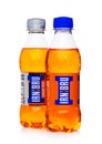 LONDON, UK - FEBRUARY 14, 2018: Small plastic bottles of IRN BRU orange soft drink on white.