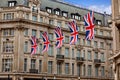 London UK flags in Oxford Street W1