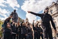 Group of Black Lives Matters protesters in front of Sir Winston Churchill Monument statue recording video clip holding their fists