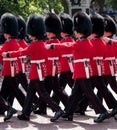 Guardsmen and women march down the The Mall, Westminster UK during the Trooping the Colour annual military parade