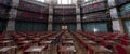 Interior of the Octagon Library at Queen Mary, University of London in Mile End, East London, with colourful leather bound books