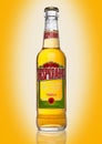 LONDON, UK - JANUARY 02, 2017: Bottle of Desperados beer on yellow background, lager flavored with tequila is a popular beer produ