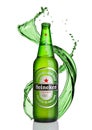 LONDON, UK -JANUARY 02, 2017: Bottle of Heineken Lager Beer with splash on white background. Heineken is the flagship product of H