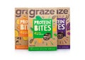 LONDON, UK - JANUARY 10, 2018: Boxes of Graze oat squares bites on white Royalty Free Stock Photo