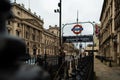 London UK January 2021 Entrance to the Westminster underground tube station. Cold winter day, union jack flag in the background.