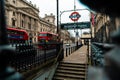 London UK January 2021 Entrance to the Westminster underground tube station. Cold winter day, union jack flag in the background.