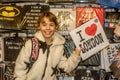 Happy little girl holding shirt with London sign