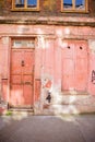 Portrait View of a Little Girl Painted on the Wall of a Deteriorated Building