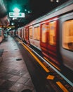 London UK January 2021 London Tube underground metro approaching the station platform, blurred in motion with long exposure. Royalty Free Stock Photo