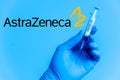 London, UK - 5 january 2021: young male doctor holding astrazeneca covid-19 vaccine vial. concept of science and coronavirus