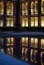 Photo of theJohn Madejski Garden at the Victoria and Albert Museum, photographed at night with reflection in the water.