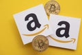LONDON, UK - July 2021: Bitcoin cryptocurrency on an amazom e-commerce logo