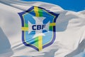 LONDON, UK - July 2023: Brazil national football team logo badge on a flying flag. 3D Rendering