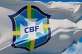 LONDON, UK - July 2023: Brazil national football team logo badge on a flying flag. 3D Rendering