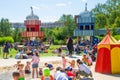 Children\'s play ground at hot summer day and kids playing with sand and water. Royalty Free Stock Photo