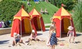 Children\'s play ground at hot summer day and kids playing with sand and water. Royalty Free Stock Photo